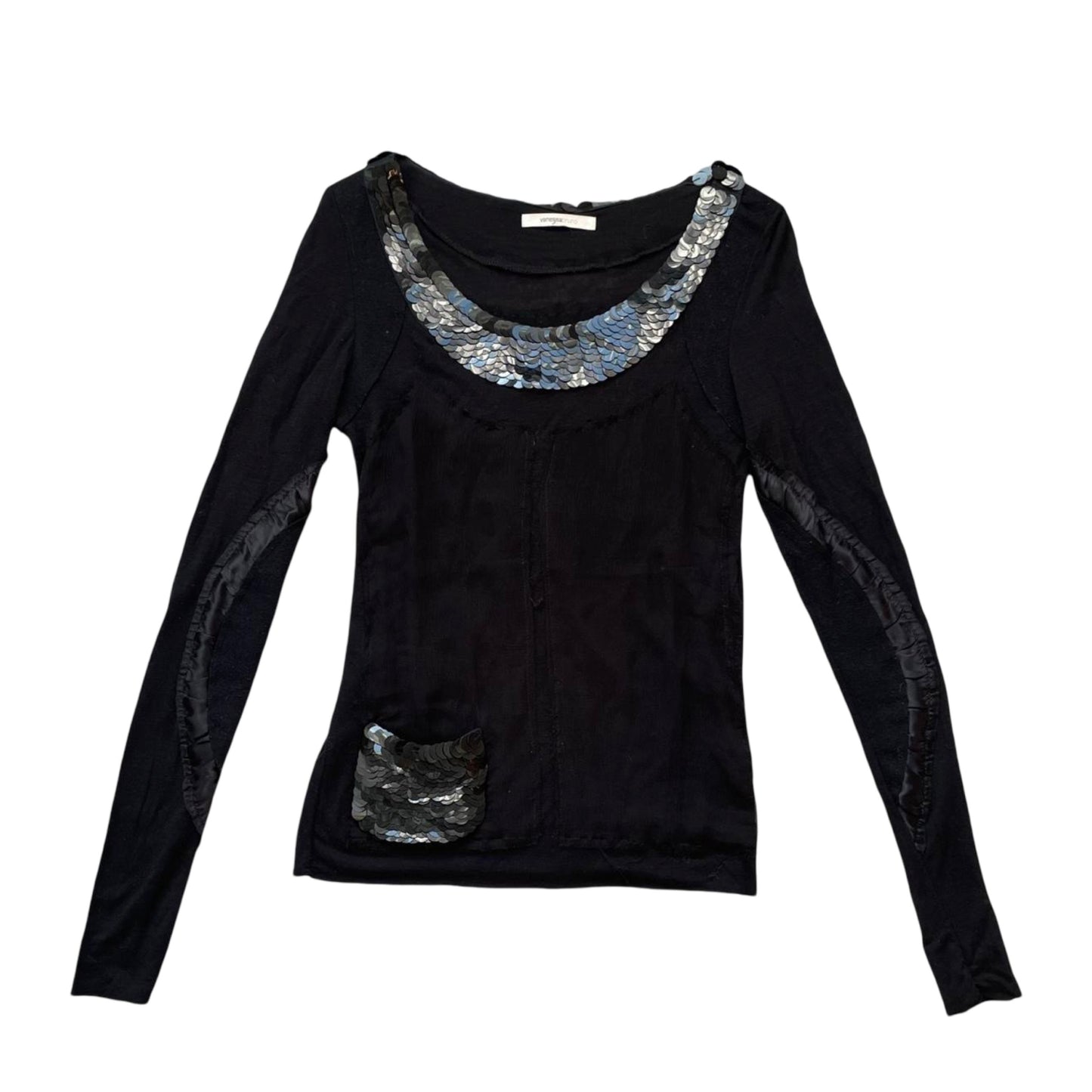 Multi-fabric patchwork black top with sequins.