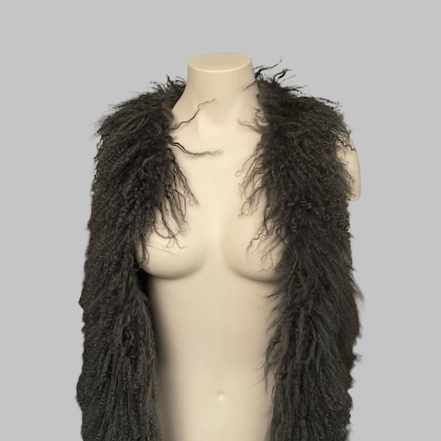 Mongolian fur sleeveless leather vest.
