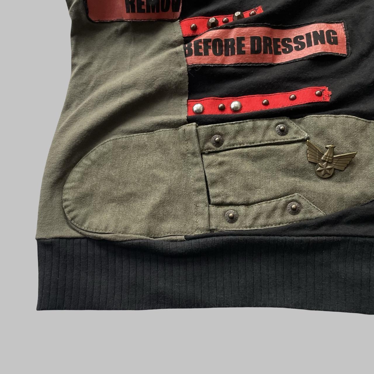 Italian multi-fabric long sleeve khaki and black top.
