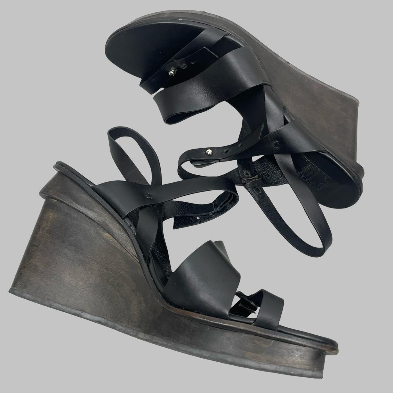Marithé + François Girbaud black leather wooden wedge sandals.