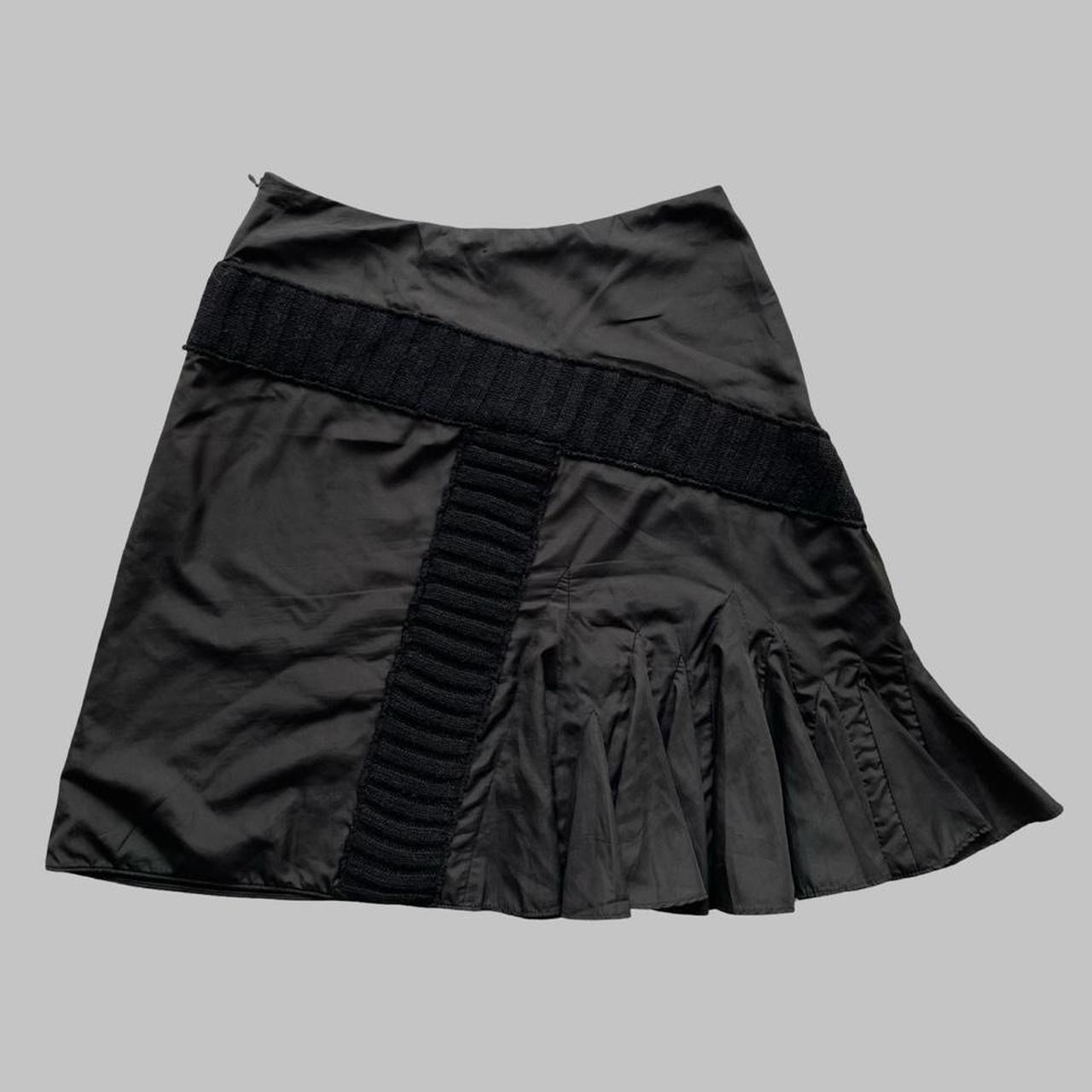 Italian multi-fabric black skirt.