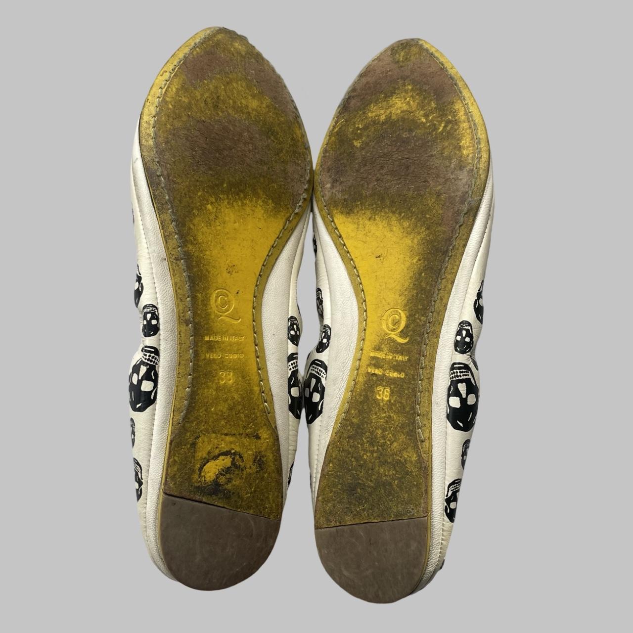 Alexander McQueen skull ballet flats.