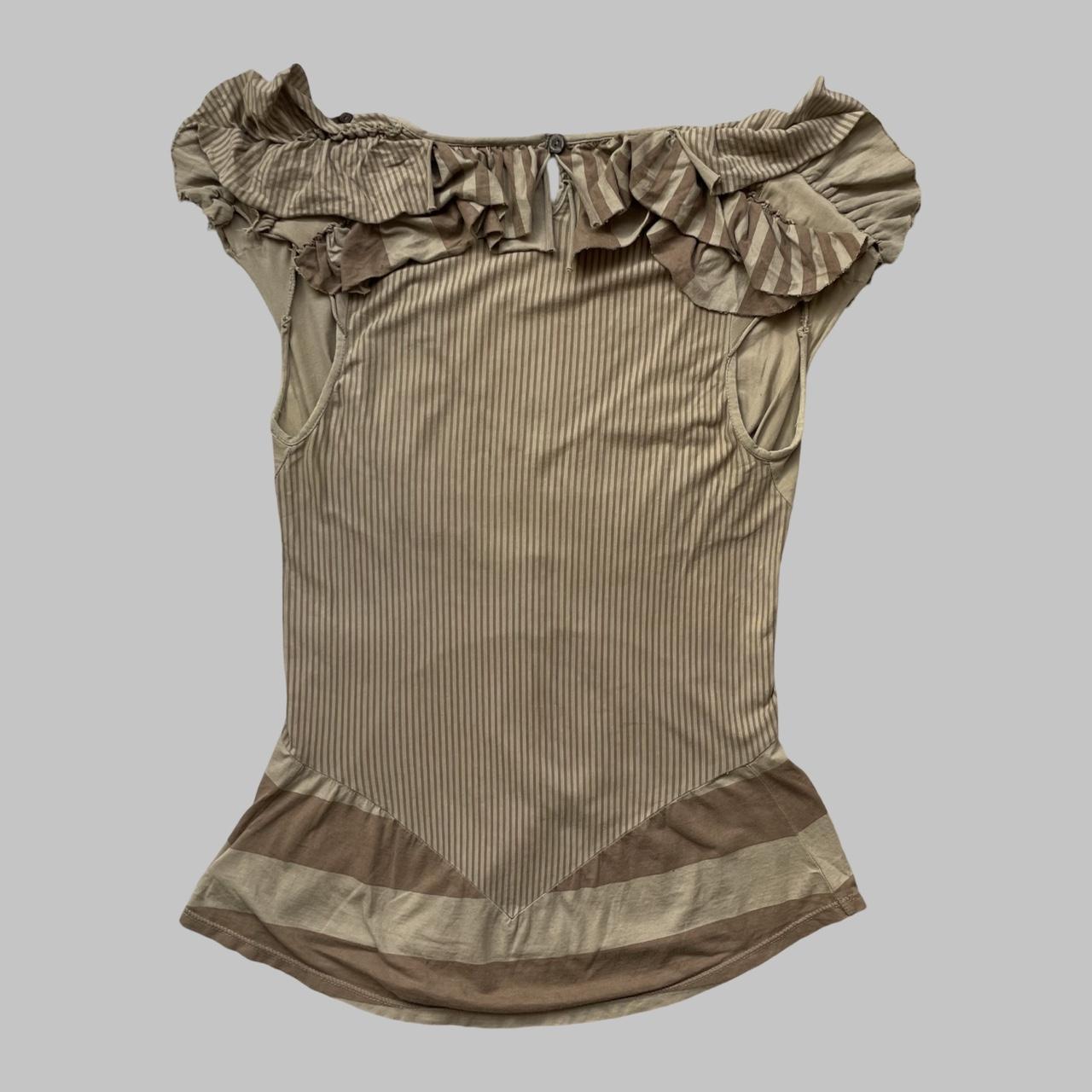 Beige and taupe striped top with studs.