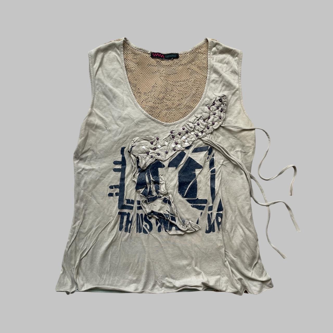 Beige double layered distressed tank top.
