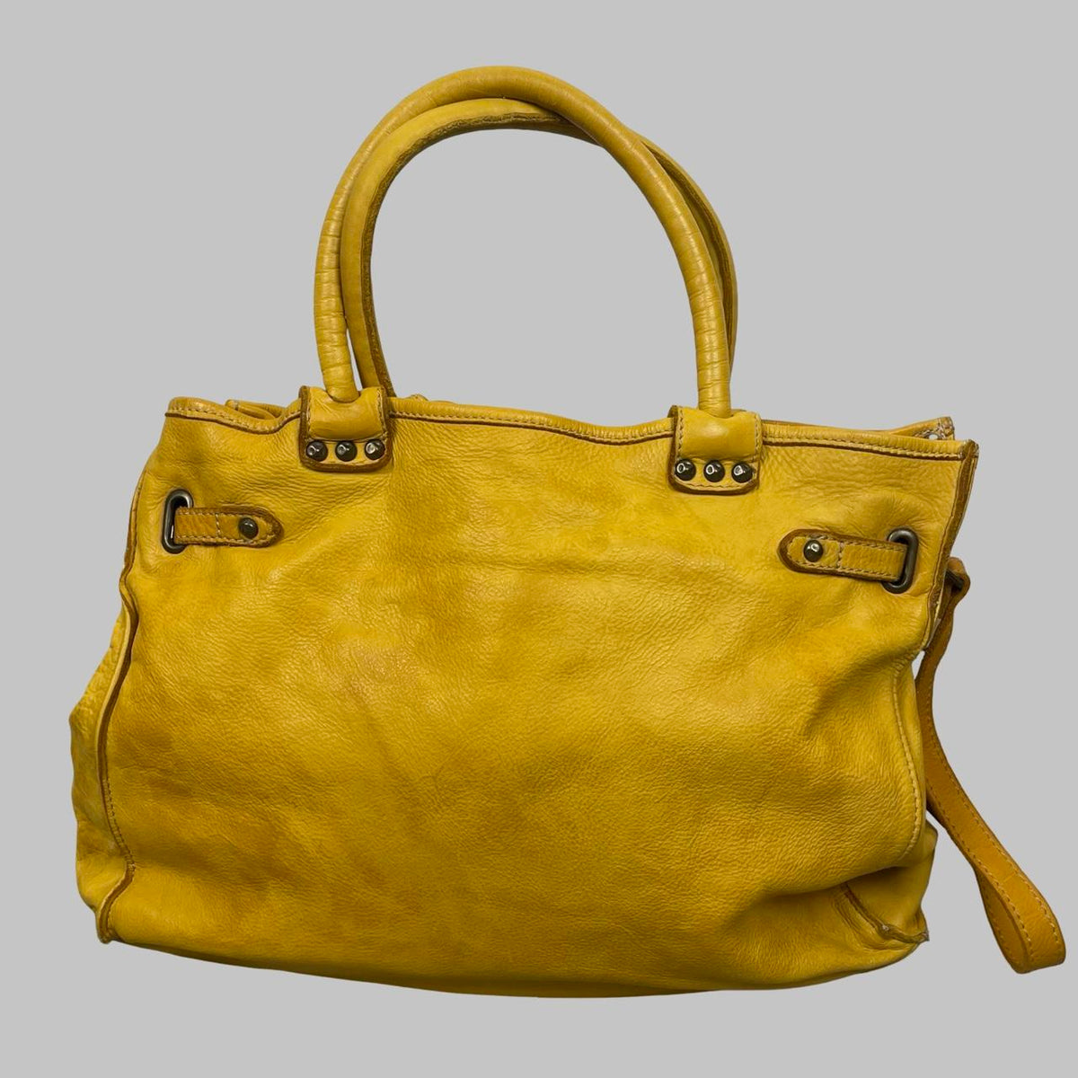 Large yellow leather studded firkin bag. — photo 7