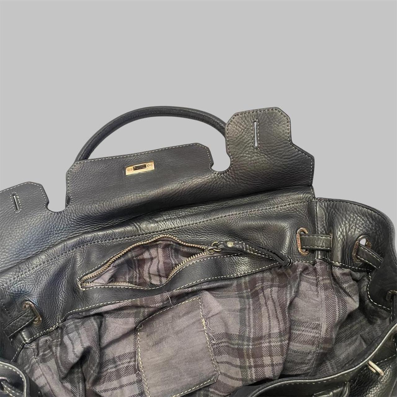 Black (large) leather firkin bag.
