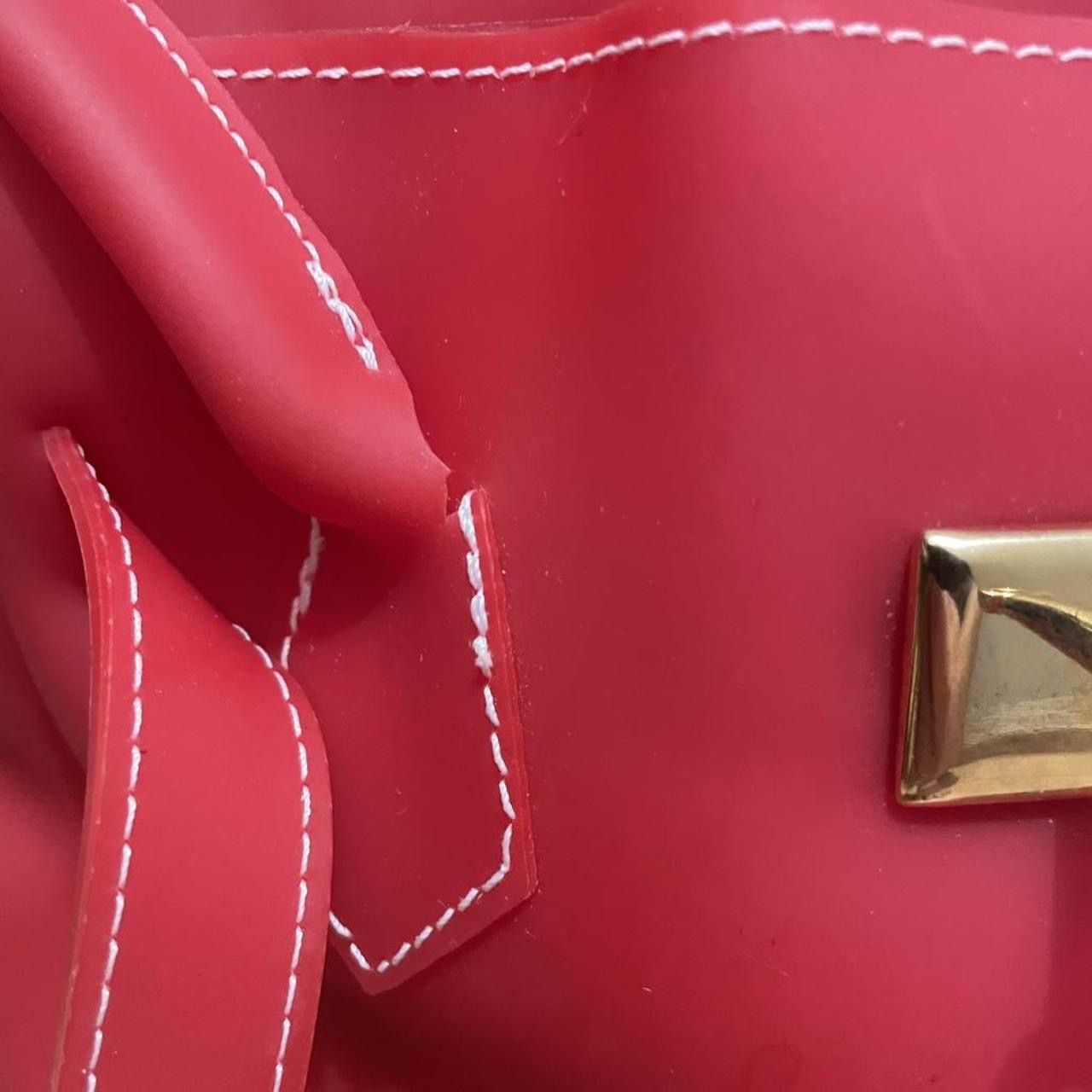 Red jelly pvc firkin bag.