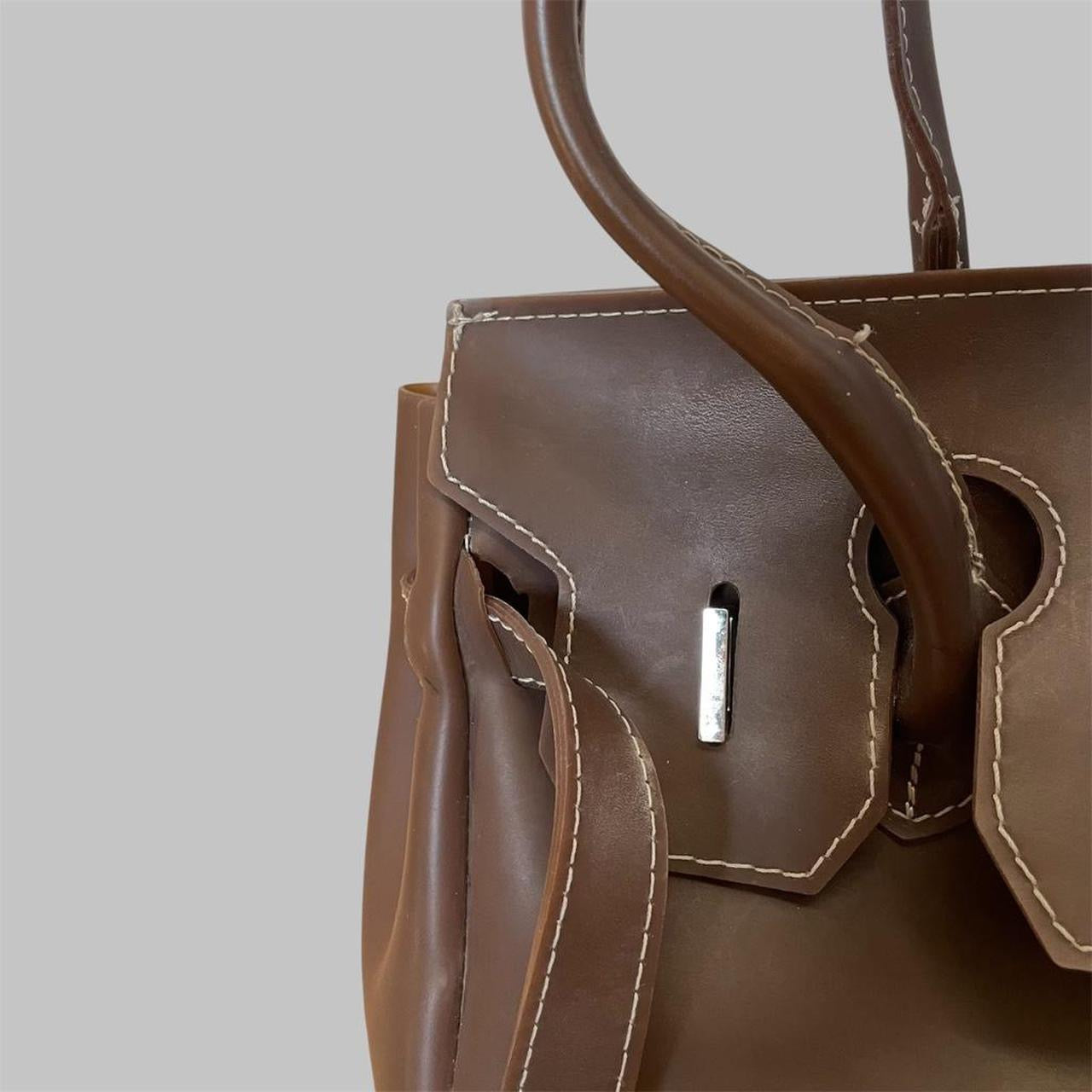 Italian brown pvc jelly firkin bag.
