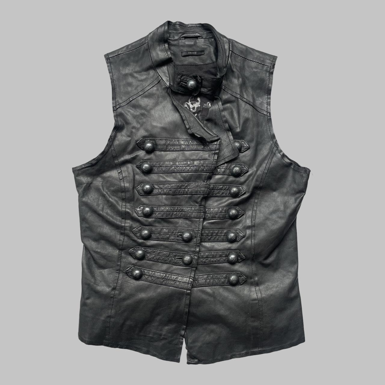 Sleeveless black leather officer jacket.