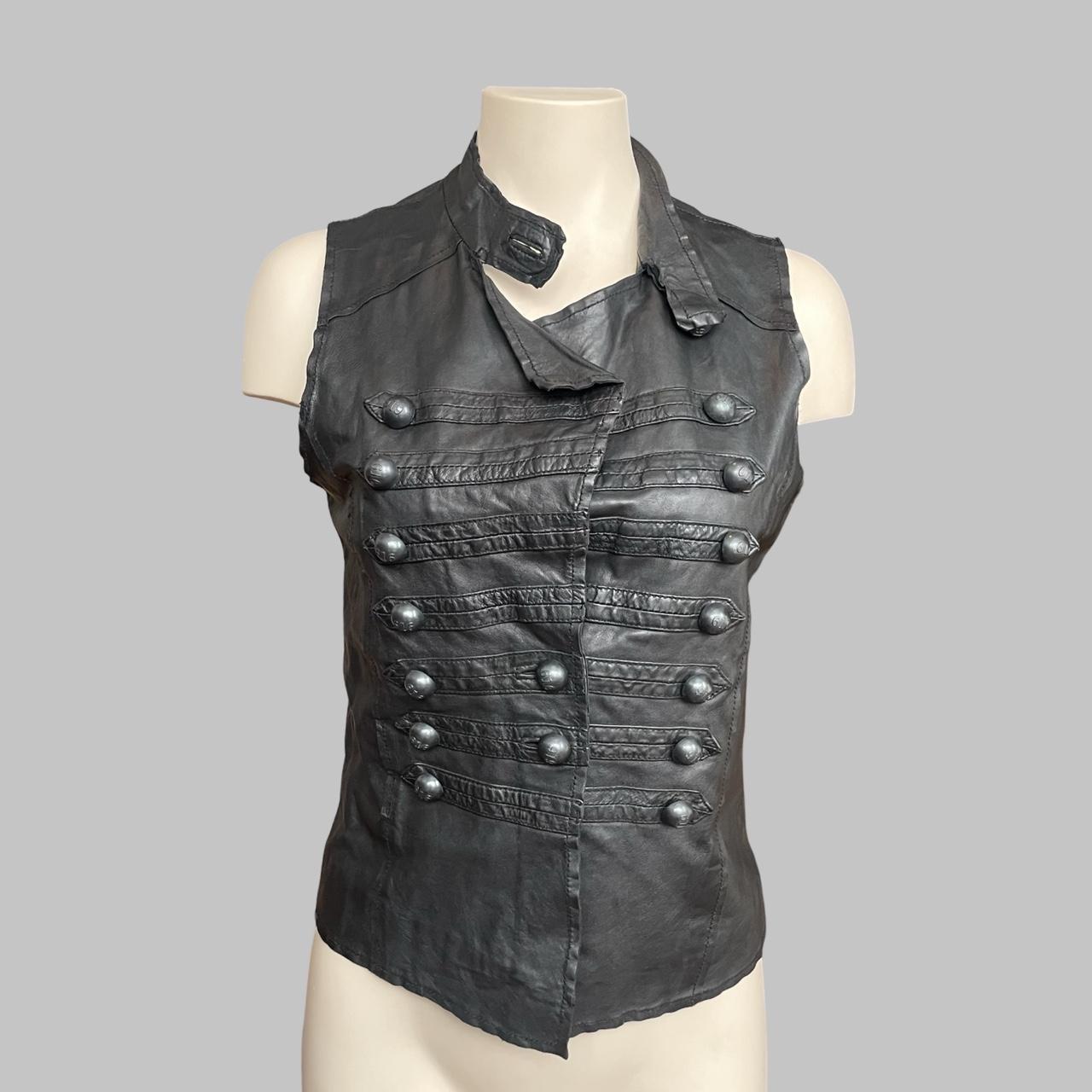 Sleeveless black leather officer jacket.