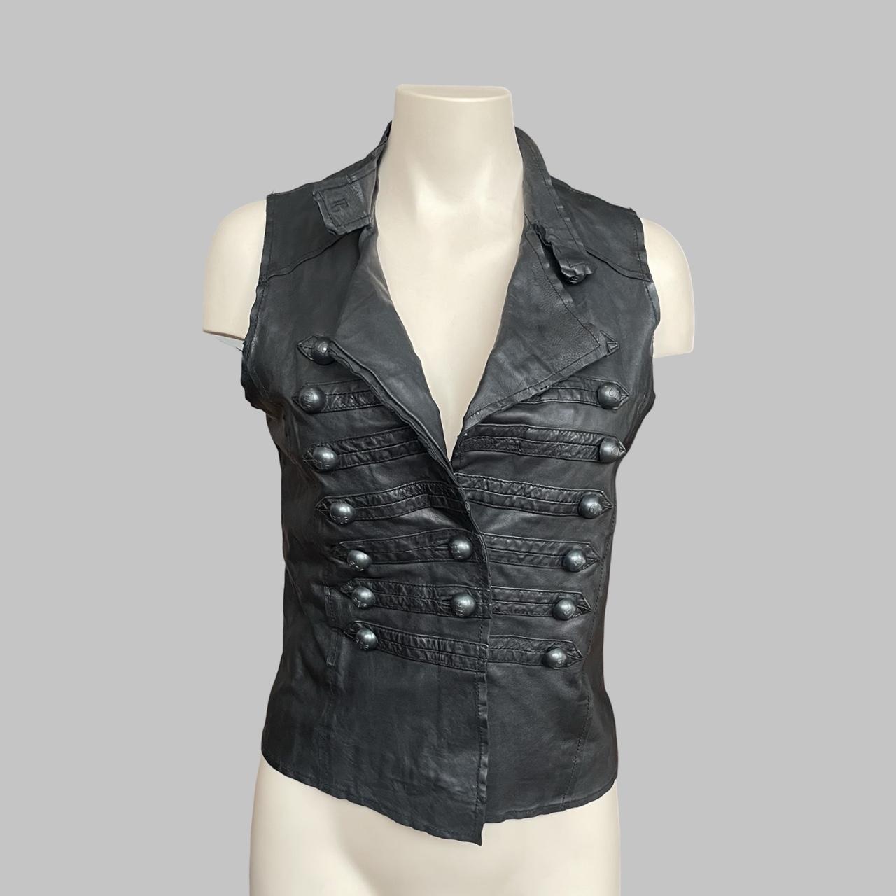 Sleeveless black leather officer jacket.