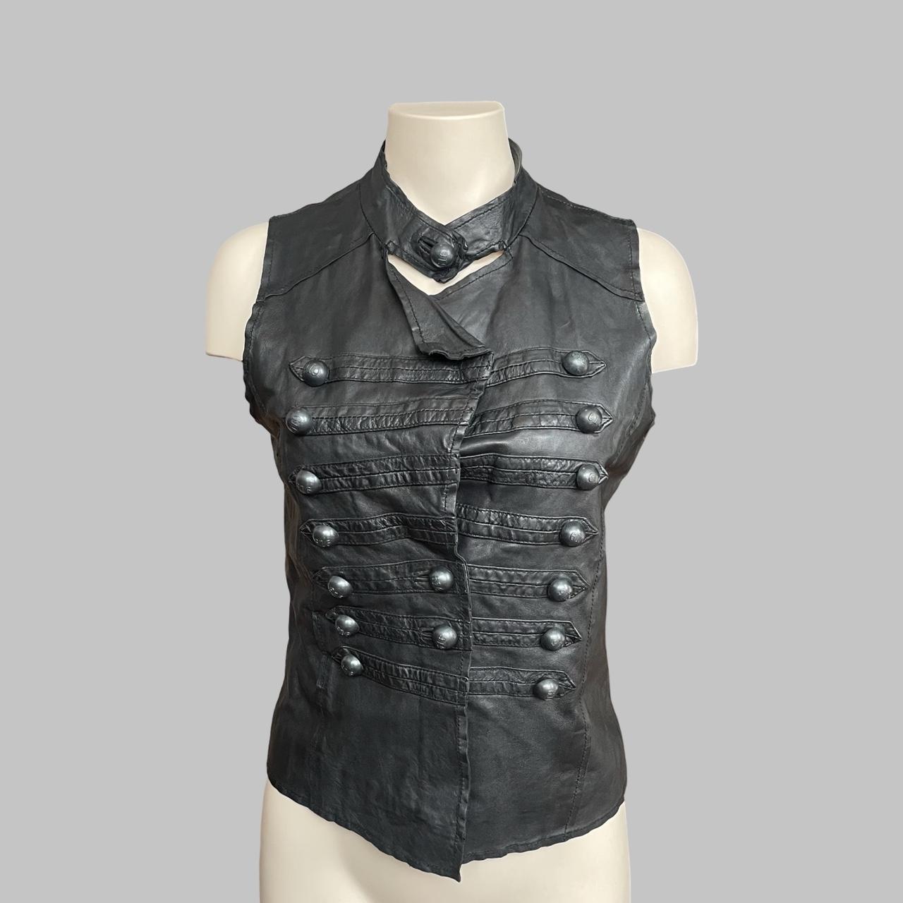 Sleeveless black leather officer jacket.