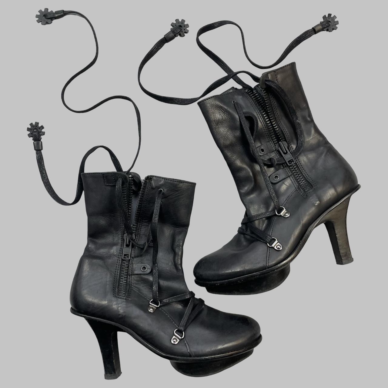 Marithé + Francois Girbaud black leather ankle booties.