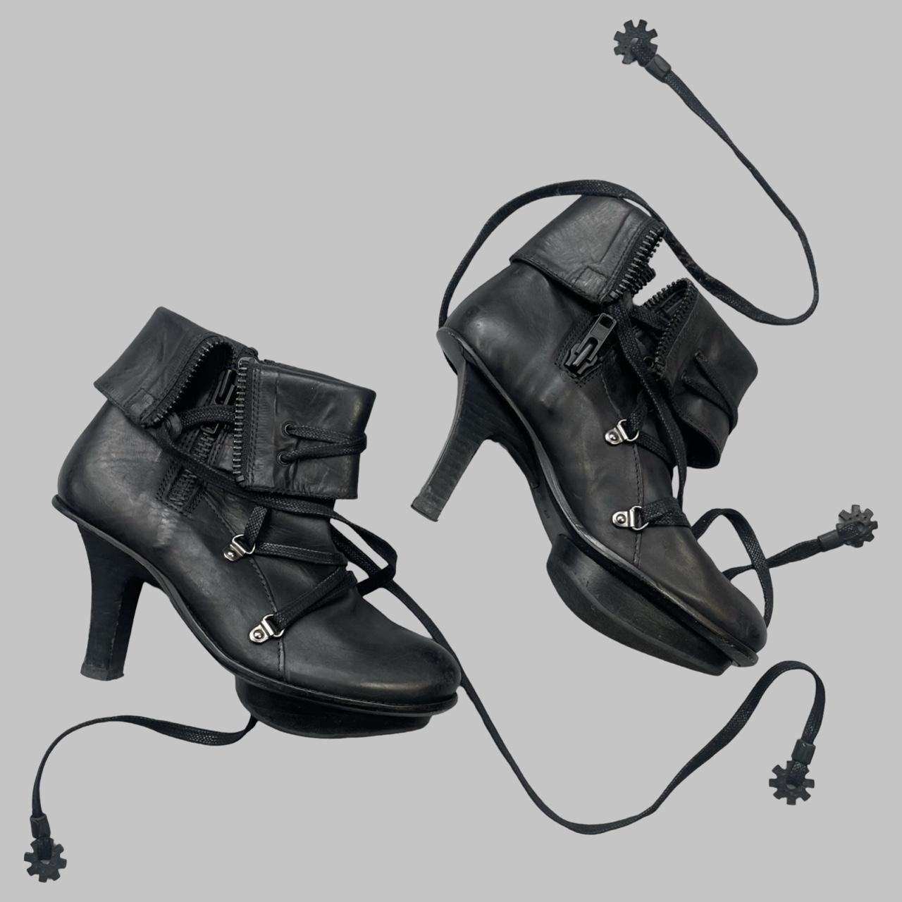 Marithé + Francois Girbaud black leather ankle booties.