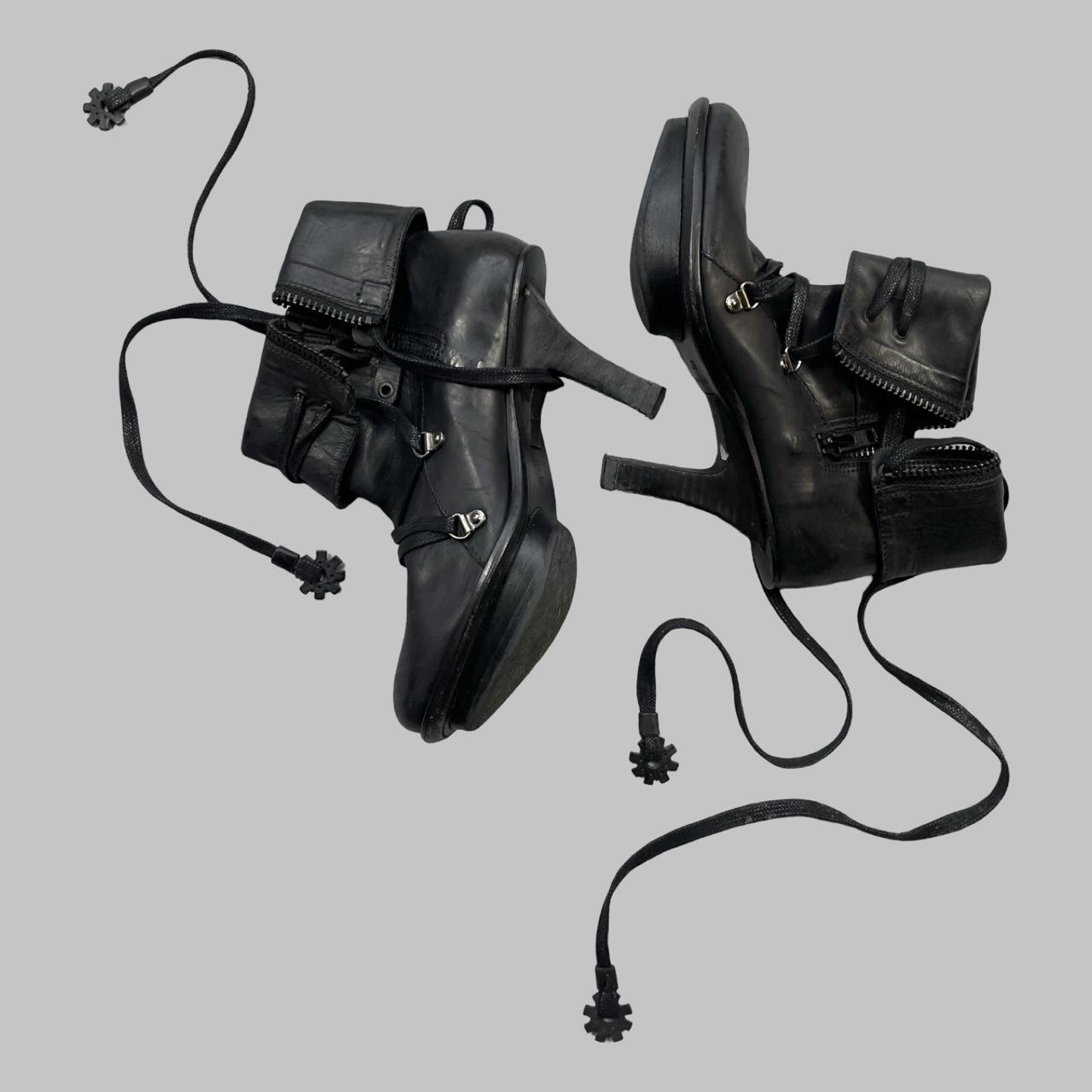 Marithé + Francois Girbaud black leather ankle booties.