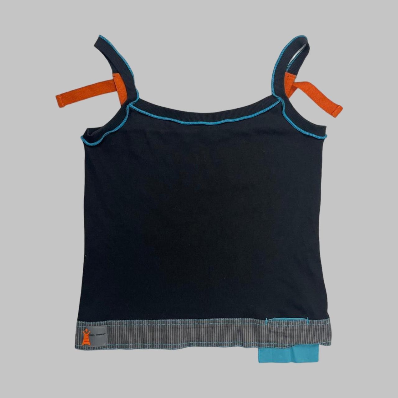Cop copine orange and black top.