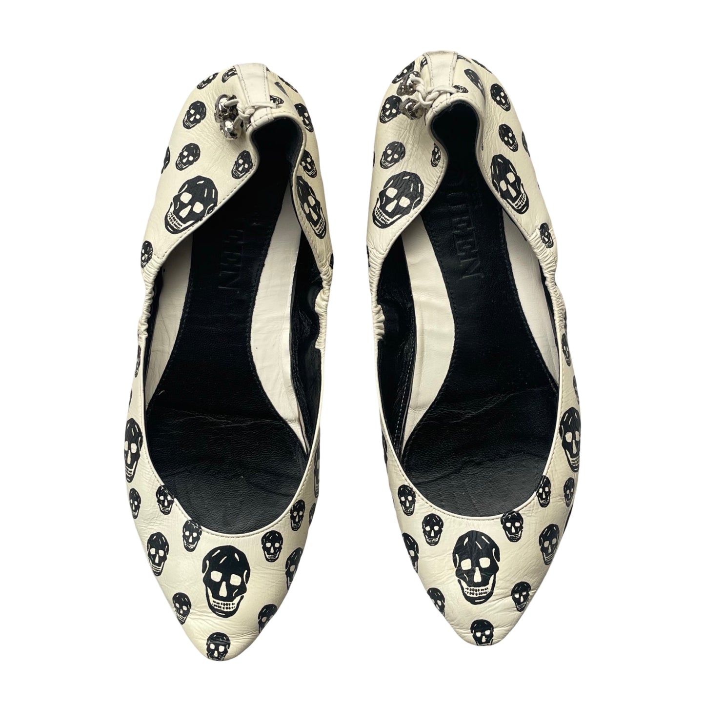 Alexander McQueen skull ballet flats.