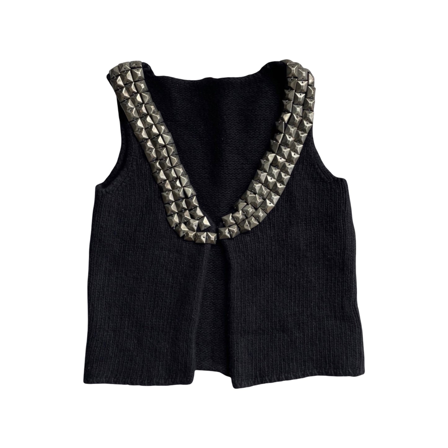 Sleeveless knit black vest with silver studs.
