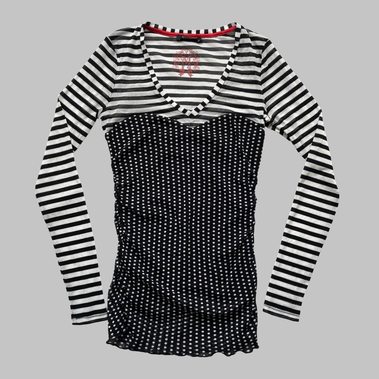 Black & white polkadots and stripes shirt.