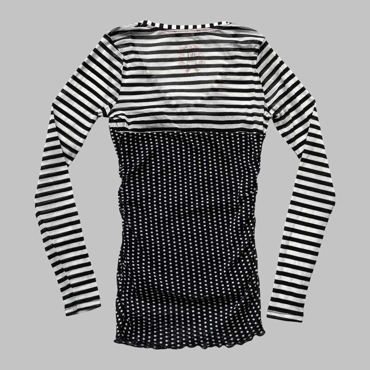 Black & white polkadots and stripes shirt.