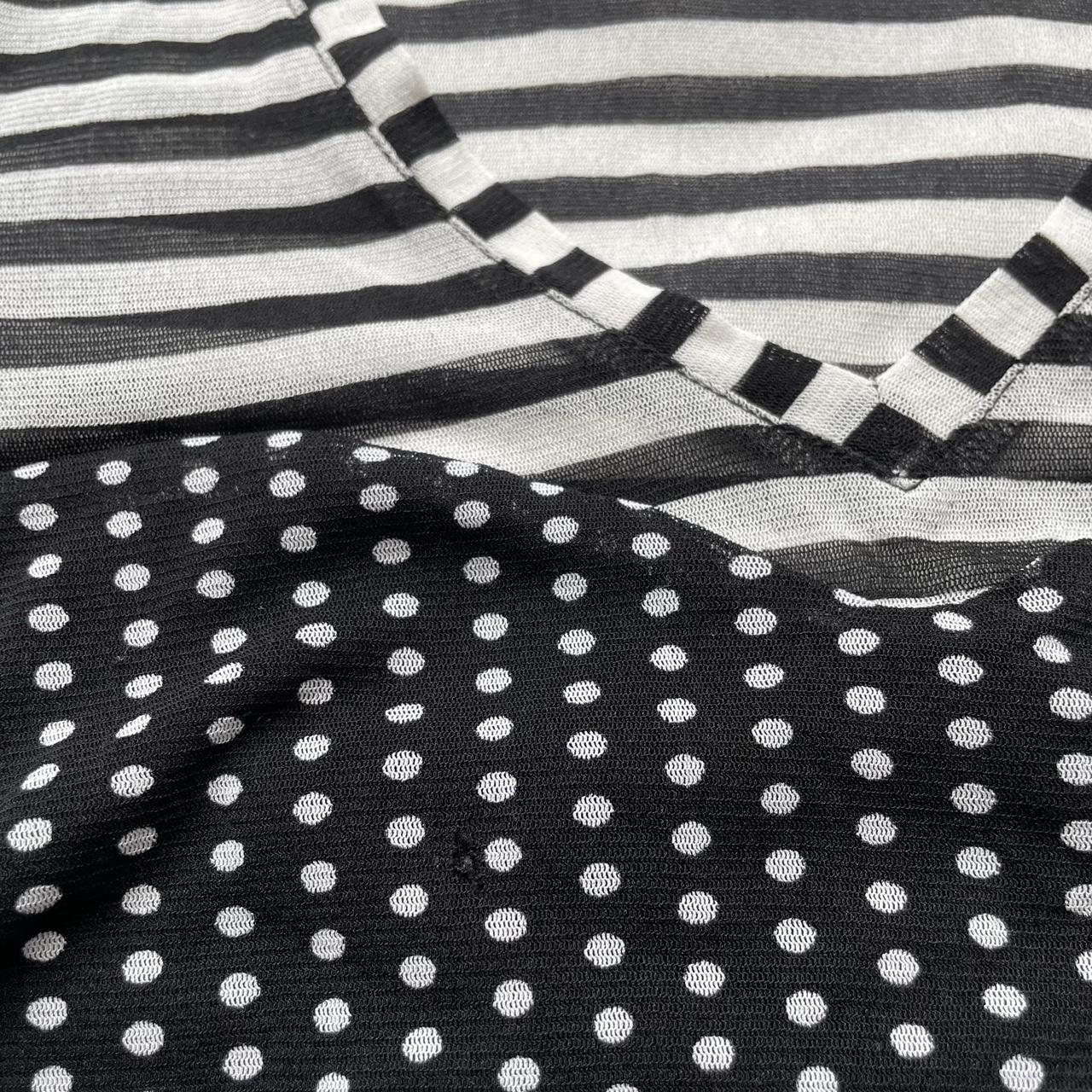 Black & white polkadots and stripes shirt.