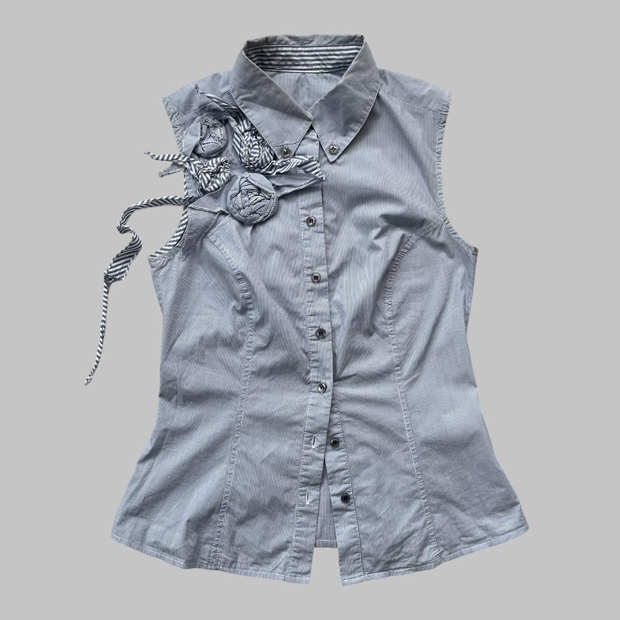 Blue striped textured sleeveless shirt.