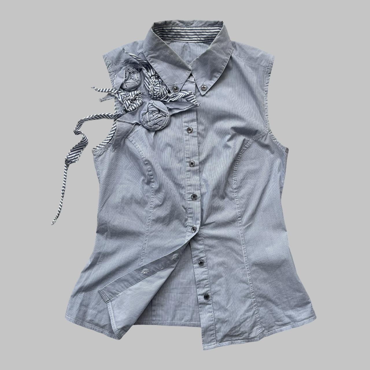 Blue striped textured sleeveless shirt.