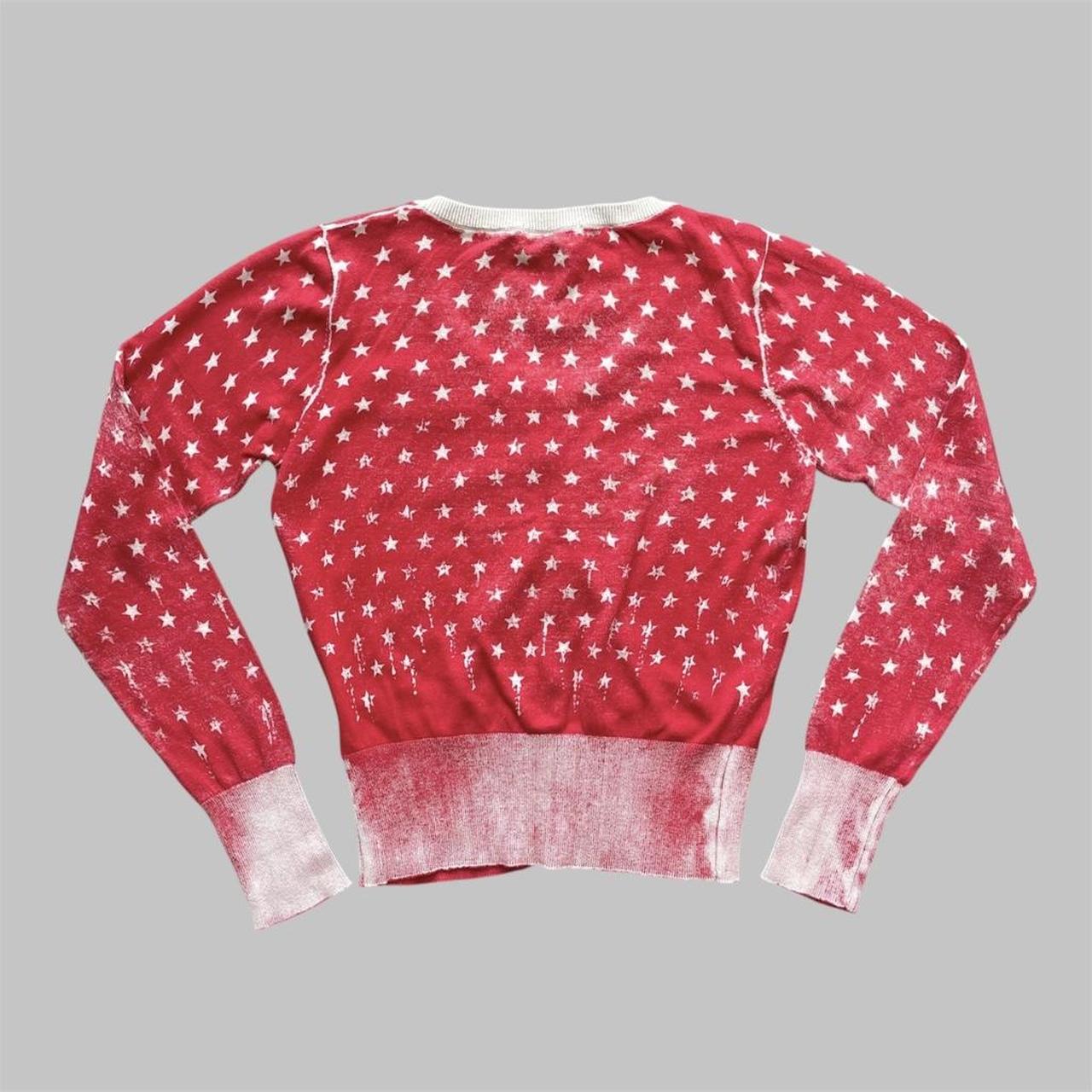 Red and white cardigan.