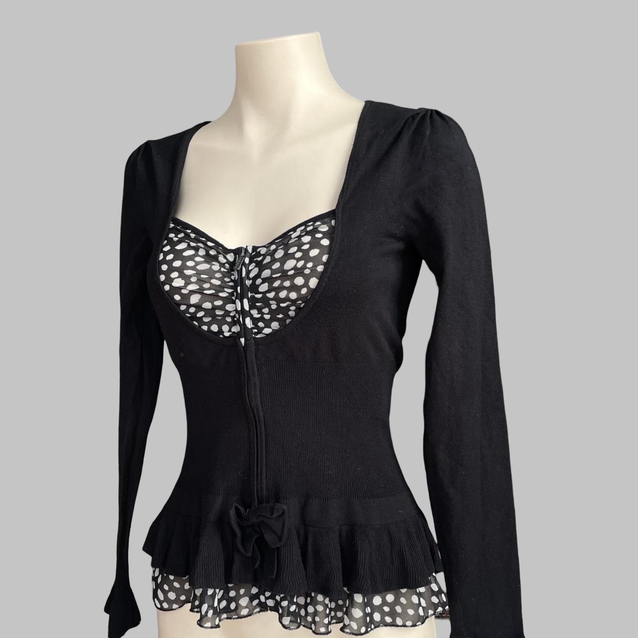 Bi-material zip up black blouse with polkadots.