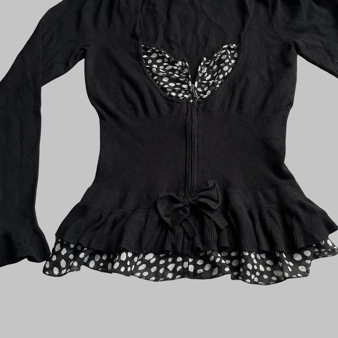 Bi-material zip up black blouse with polkadots.