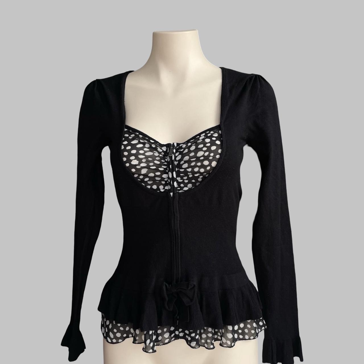 Bi-material zip up black blouse with polkadots.