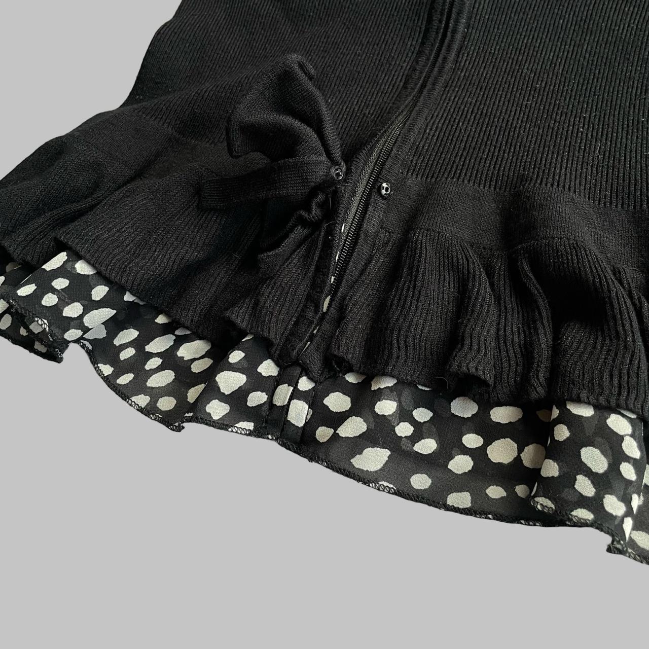 Bi-material zip up black blouse with polkadots.
