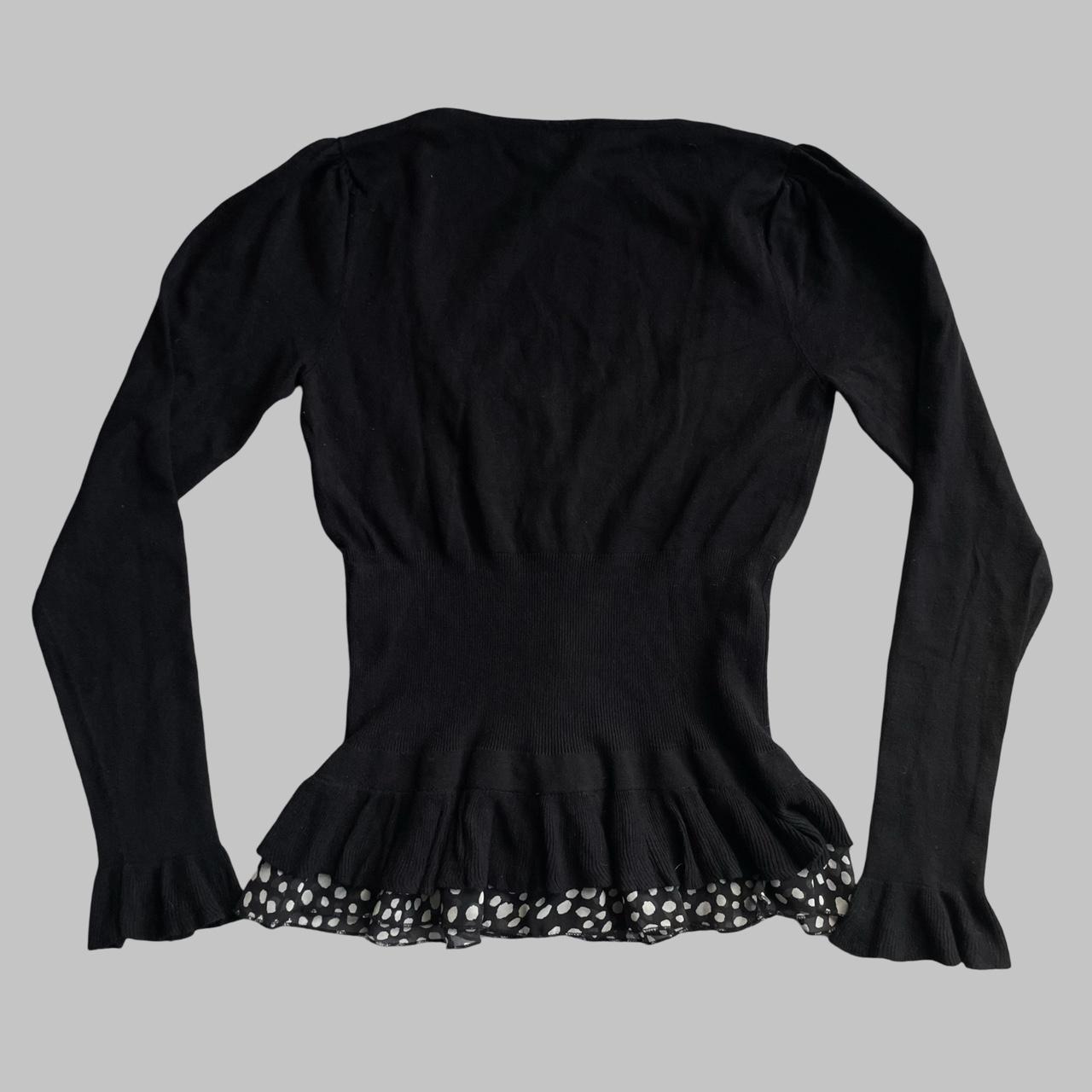 Bi-material zip up black blouse with polkadots.