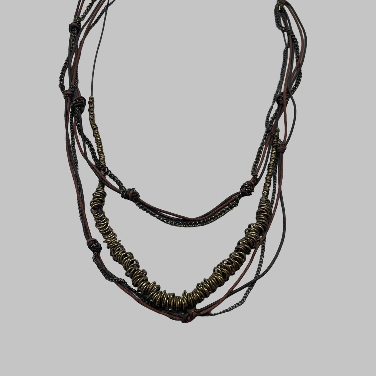 Sautoir multi-layer boho necklace.