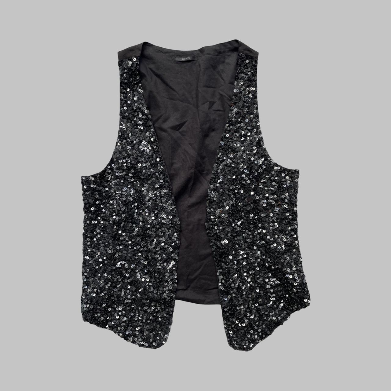 Sleeveless cotton black vest with sequins.