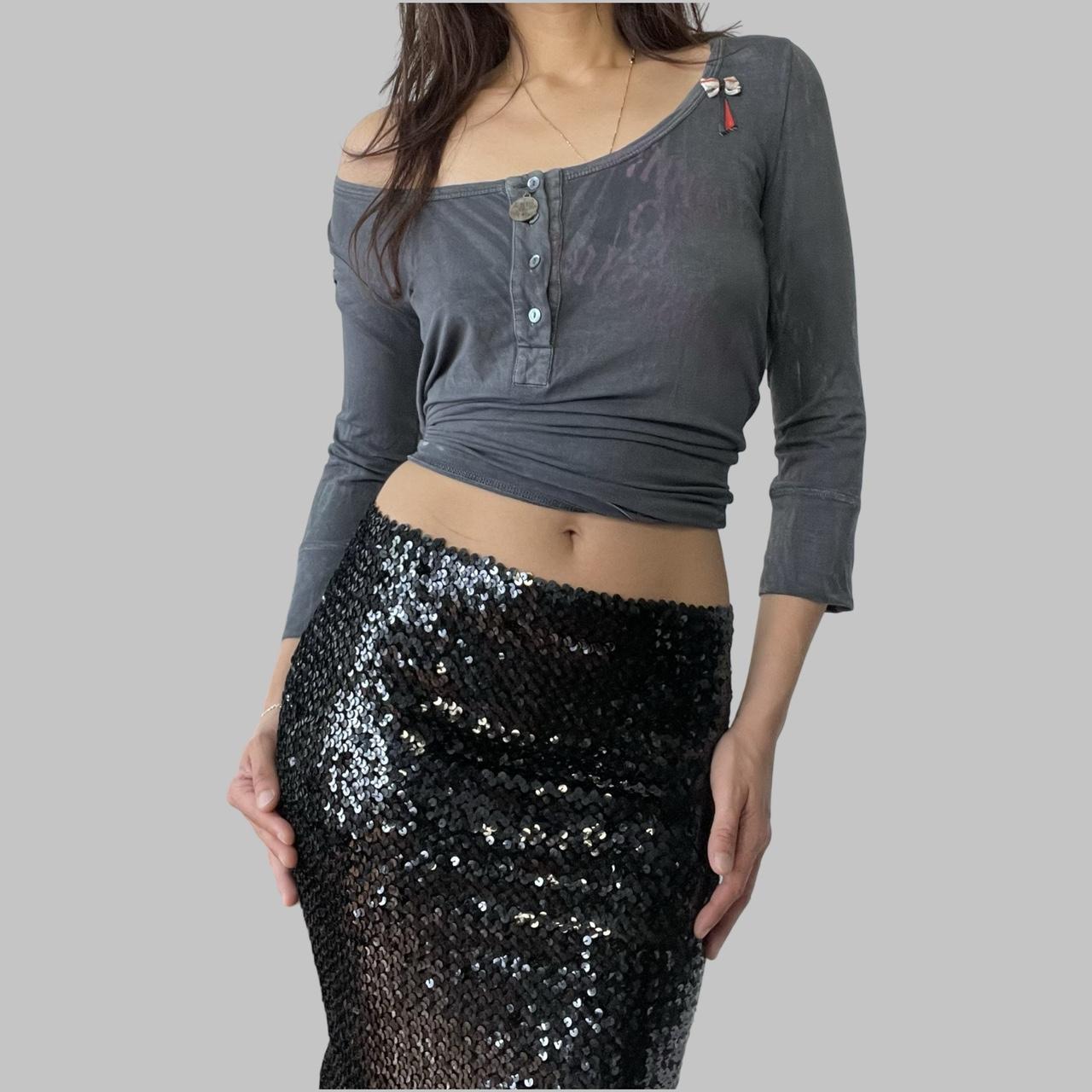 Two-way black sequin skirt / top.