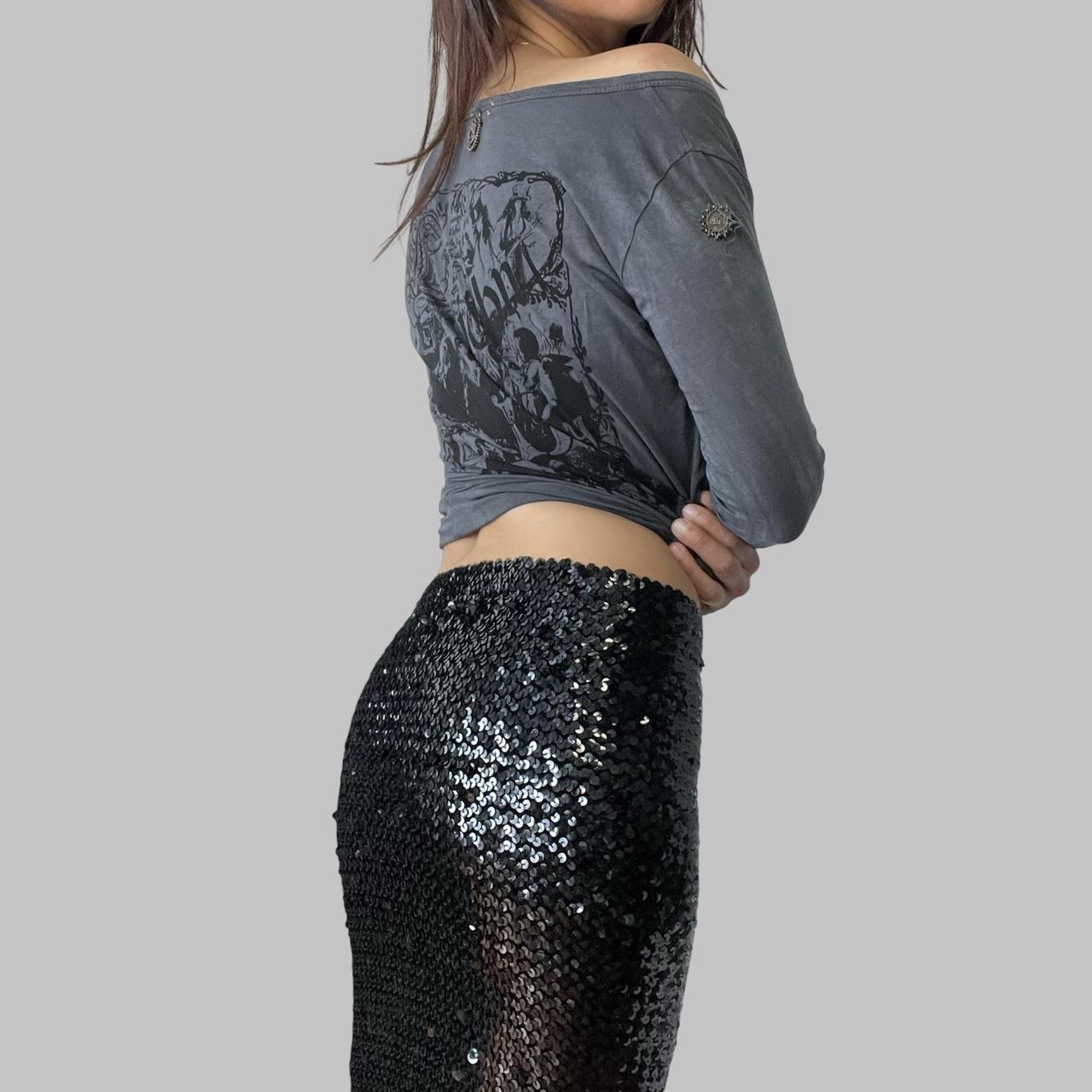 Two-way black sequin skirt / top.