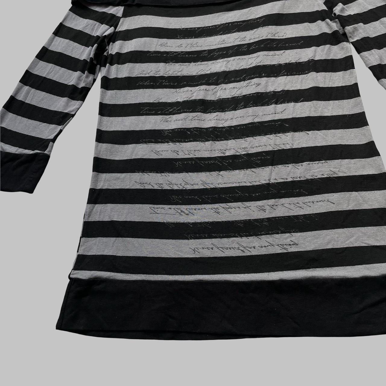 Black & grey striped top.