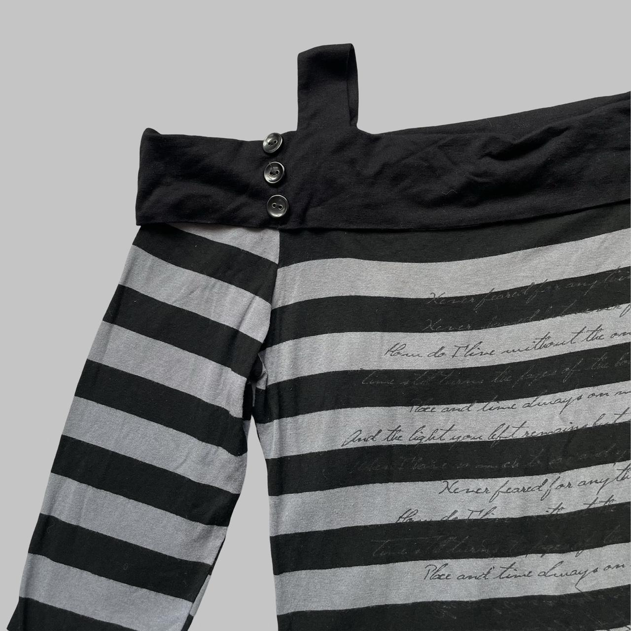 Black & grey striped top.