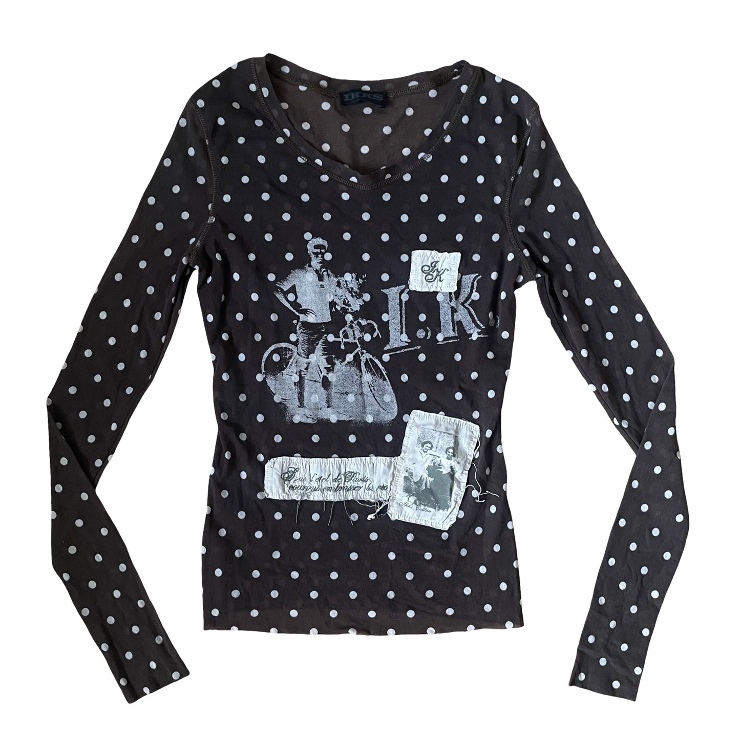 Brown polka dot mesh top.