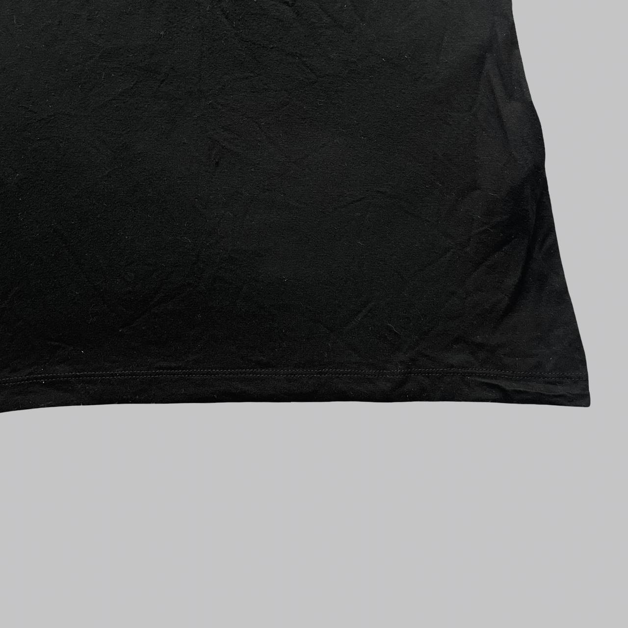 Cop copine subversive black top.