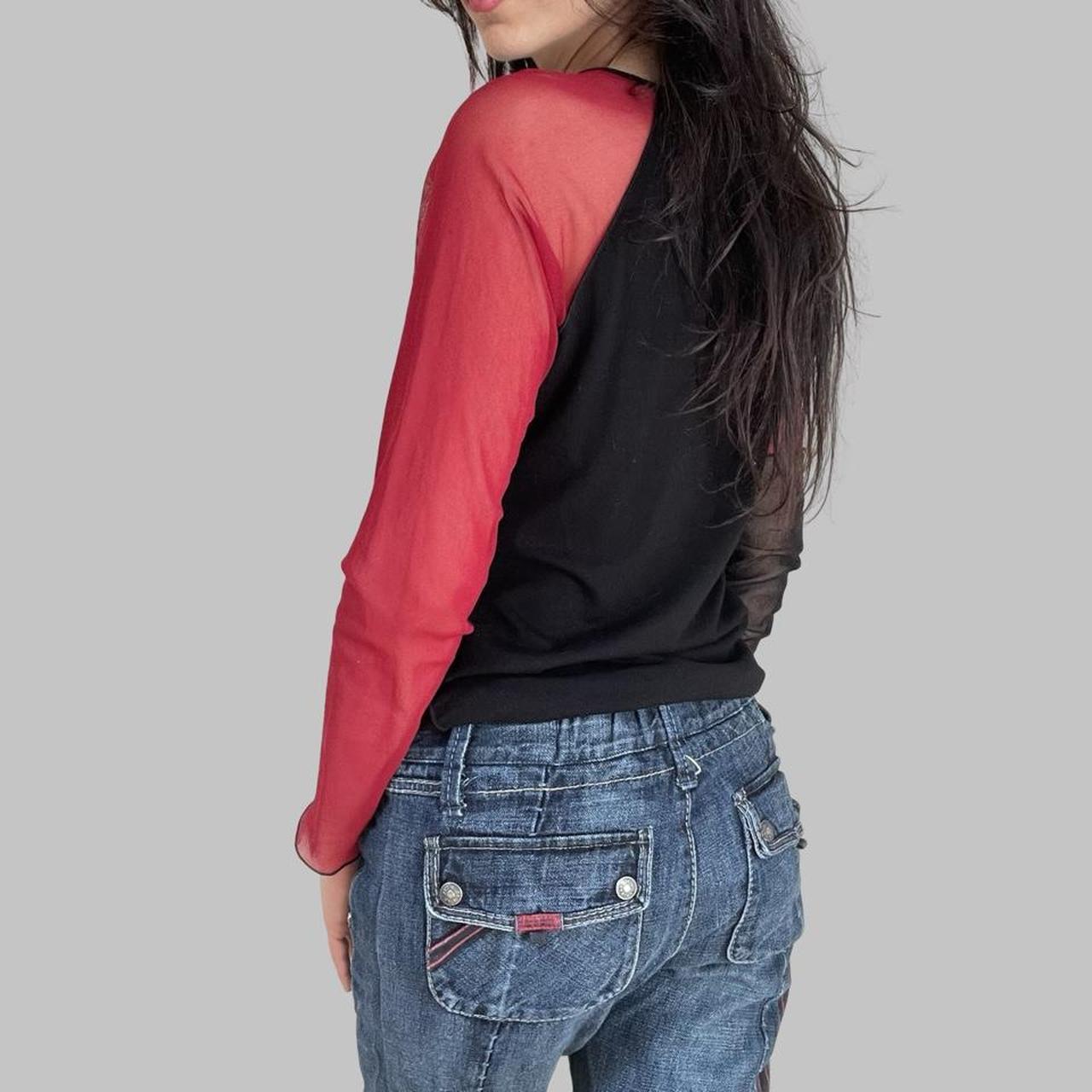 Cop copine black and red bi-material top.