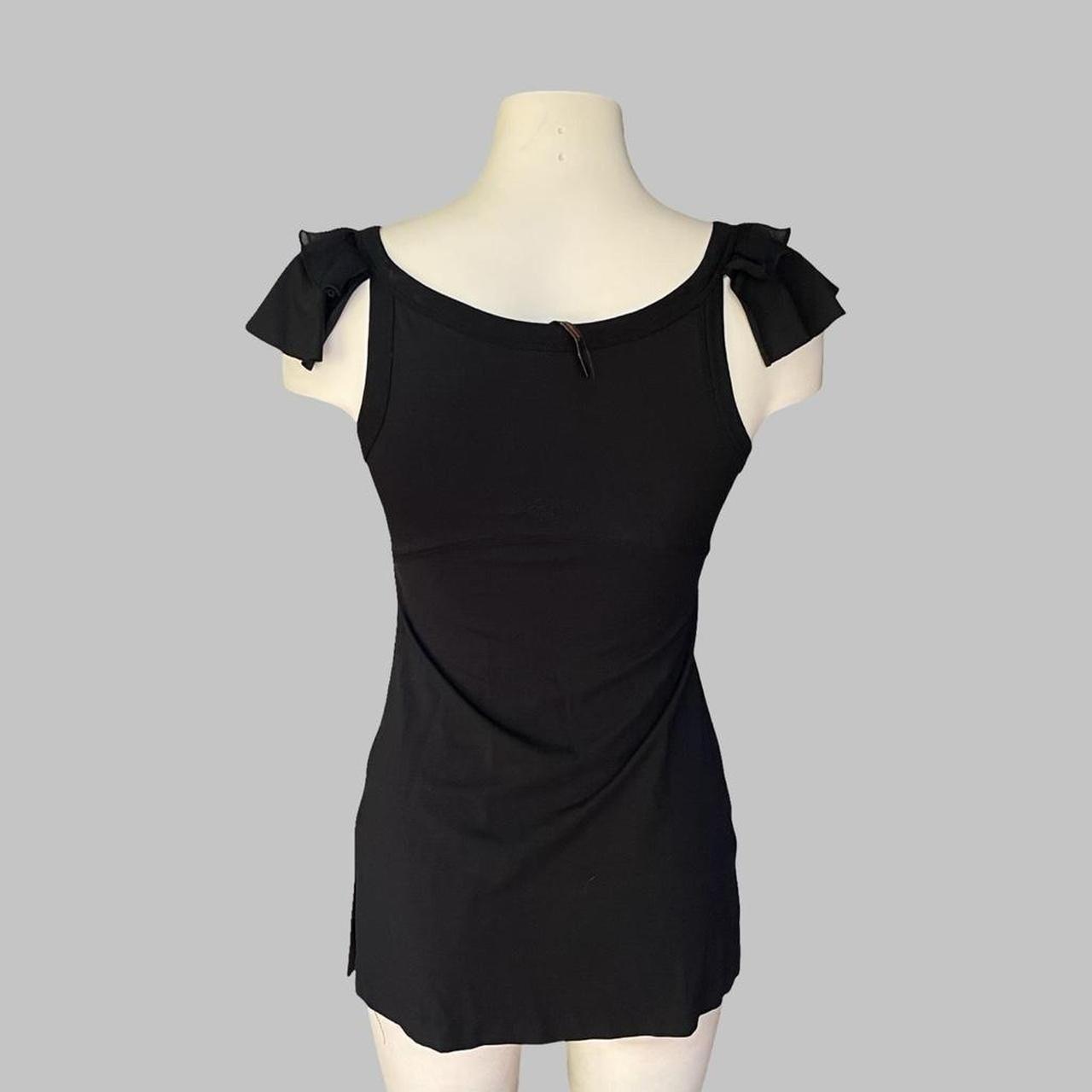 Cop copine sleeveless black top.