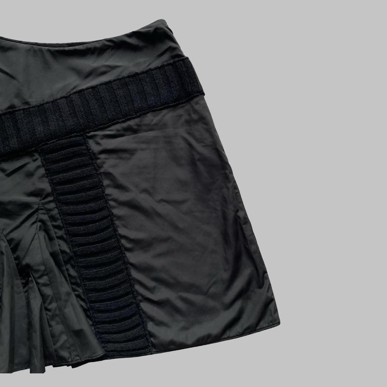 Italian multi-fabric black skirt.