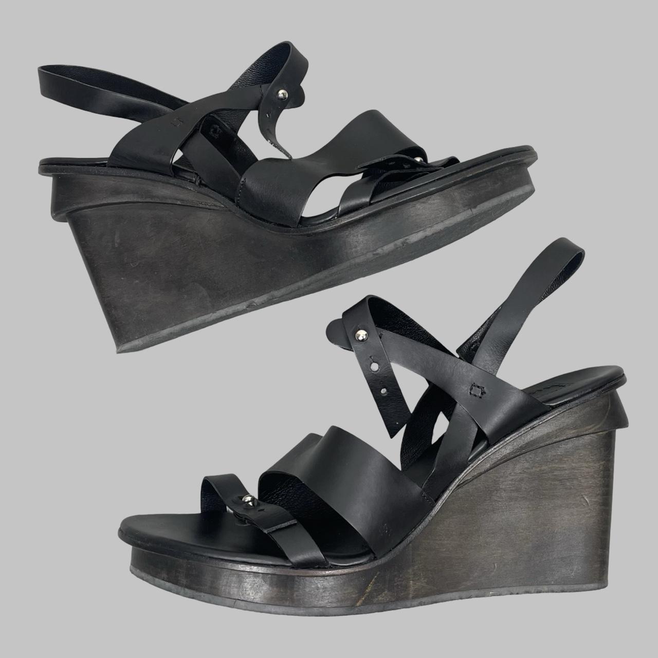 Marithé + François Girbaud black leather wooden wedge sandals.