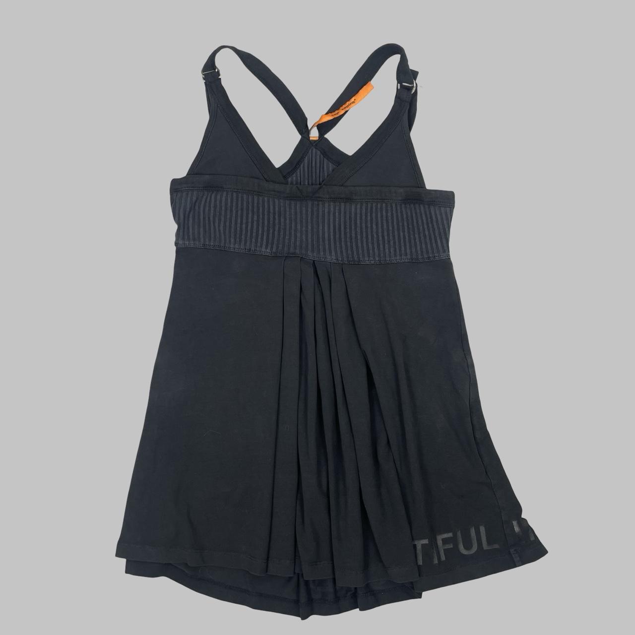 Cop Copine black sleeveless top.