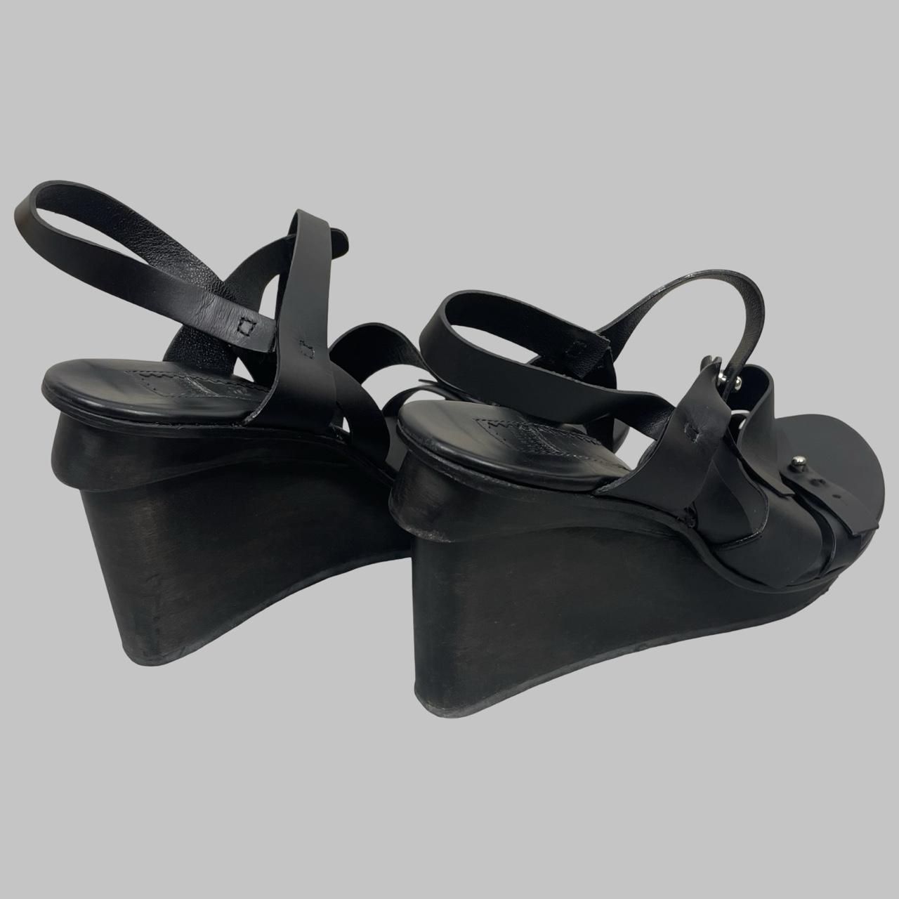 Marithé + François Girbaud black leather wooden wedge sandals.