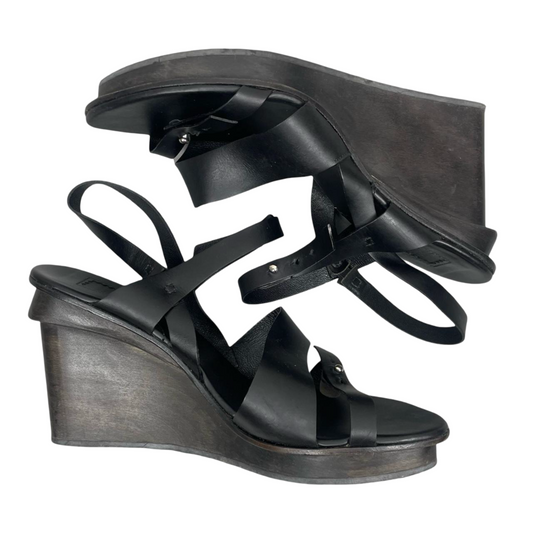 Marithé + François Girbaud black leather wooden wedge sandals.