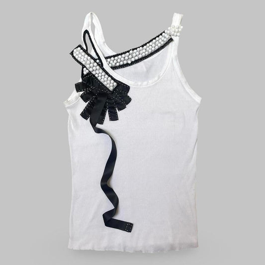 Italian white tank top with ribbons and pearls.