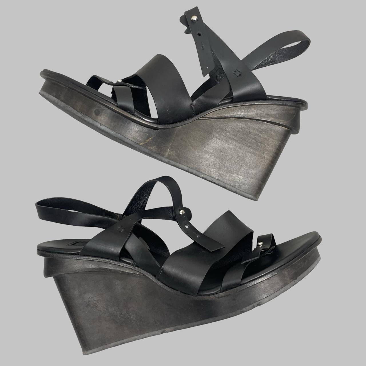 Marithé + François Girbaud black leather wooden wedge sandals.